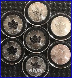 7 (seven) 2014 1 oz BU Silver Canadian Maple Leaf. 9999 Fine Silver In Capsule