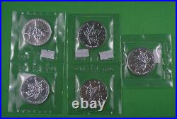 Five 1 OZ 1989.9999 Pure Silver Maple Leaf Coins Sealed