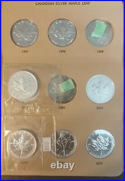 Lot of 30 1988-2020 $5 1 oz Canadian Silver Maple Leaf Coins withDansco album